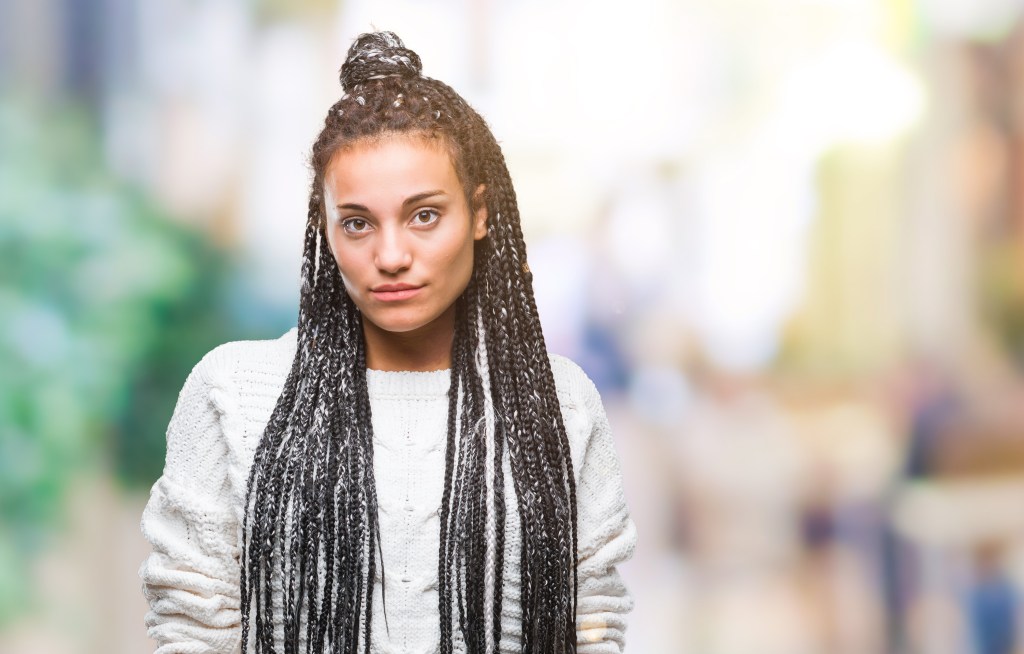 Girl sporting crochet twist half up hairstyle