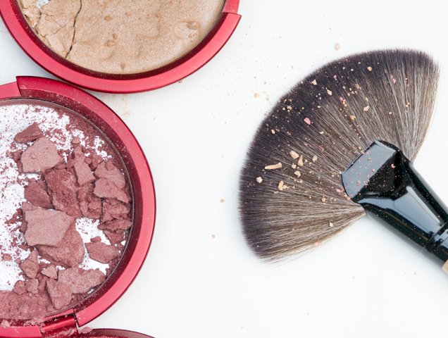 broken powder makeup and brush