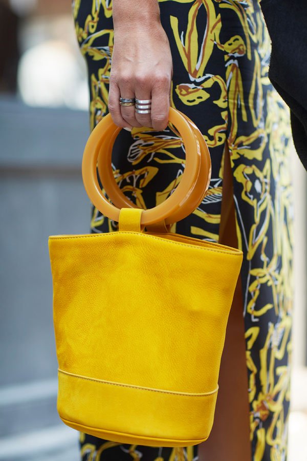 yellow top handle bag